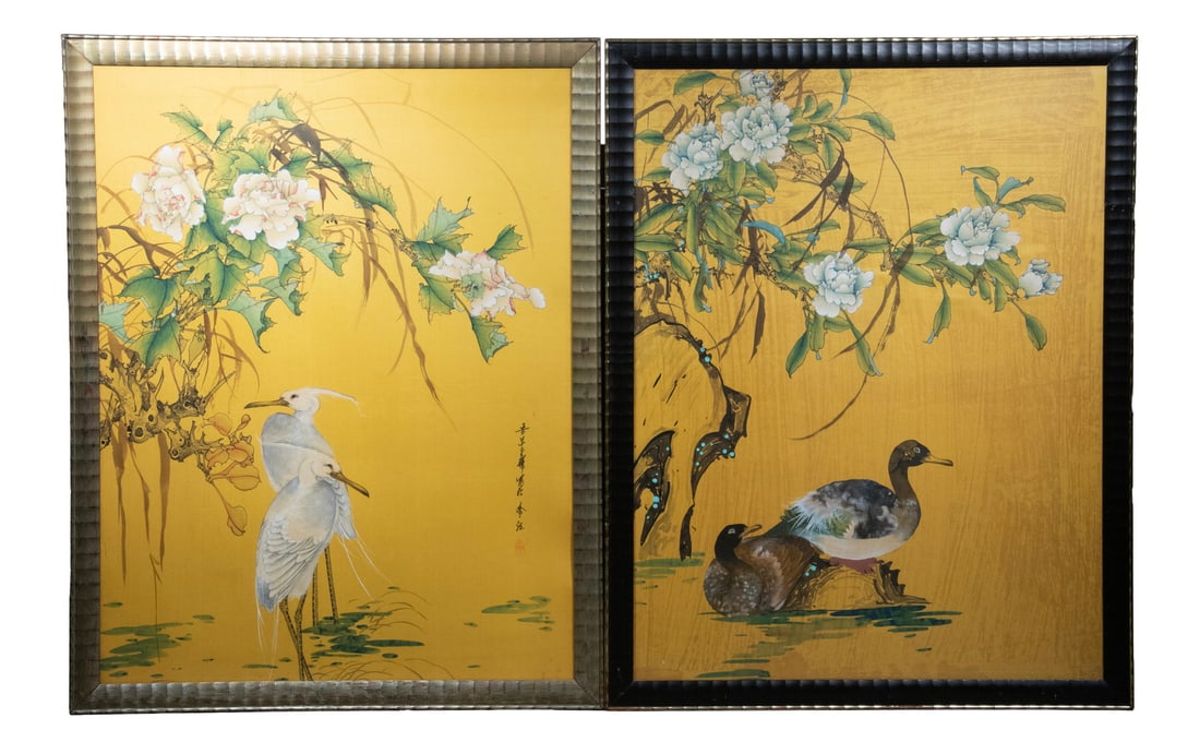 PR CHINESE BIRD AND FLOWER PAINTINGS ON SILK, 20TH CENTURY: A pair of Chinese paintings on silk, each depicting elegant waterfowl beneath flowering branches, likely peonies, set against a yellow ground. One panel portrays a pair of ducks in a waterside