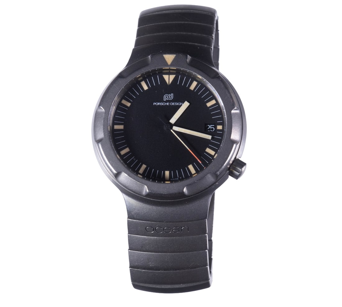 PORSCHE DESIGN TITANIUM OCEAN 2000 MEN'S WRISTWATCH: Unconventional ca. 1980's Porsche Design/IWC collaboration diver's watch. This watch features a round, full titanium case with integrated titanium bracelet and fold clasp. Also of note is the unusual