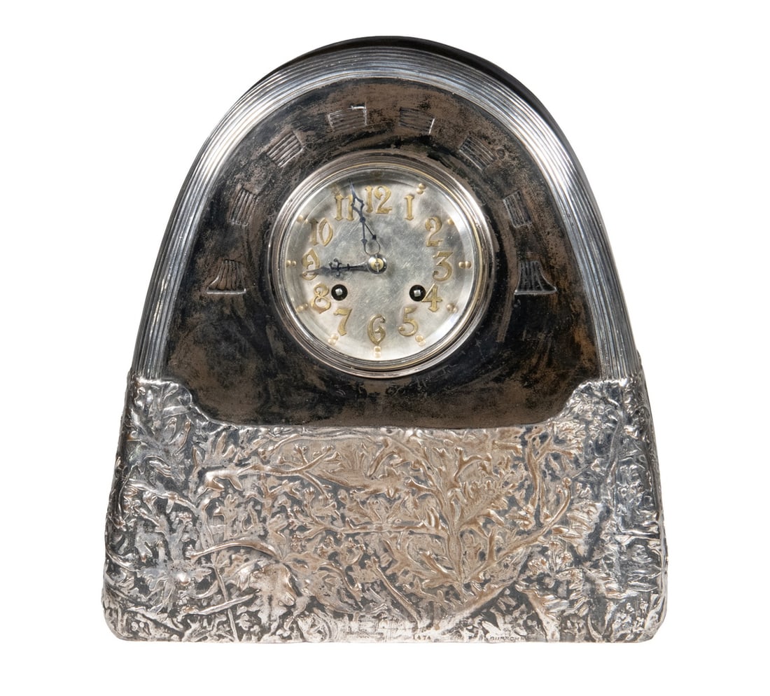GUSTAV GURSCHNER RARE VIENNESE MANTEL CLOCK, CIRCA 1900-1905: Viennese Secessionist Design by Gustav Gurschner (active 1895-1920), silver plate and patinated bronze, with original key, 8-day time and strike movement. Signed on lower edge of front and marked