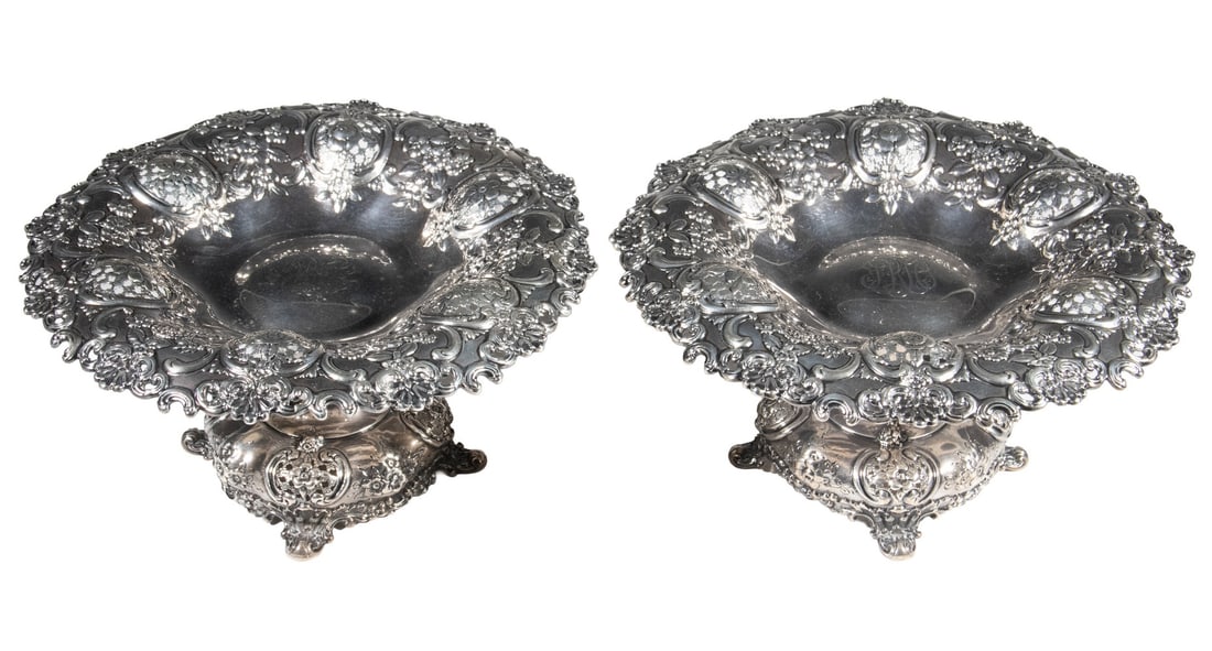 PR TIFFANY & CO. STERLING SILVER TAZZAS: Pair of American Antique Silver Compotes, with date mark for 1892-1902, having chased and repousse shell and floral rim decoration, engraved center script monograms, bases stamped "Tiffany & Co., Make