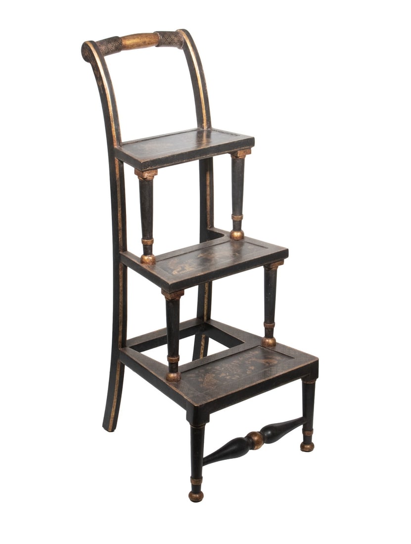 CUSTOM JAPANNED LIBRARY STEPS: Black Lacquered Steps, with gilded chinoiserie decoration, having a turned top handle, three steps, and turned front stretcher.OS: 35 x 14 x 15 in. (88.9 x 35.6 x 38.1 cm.)