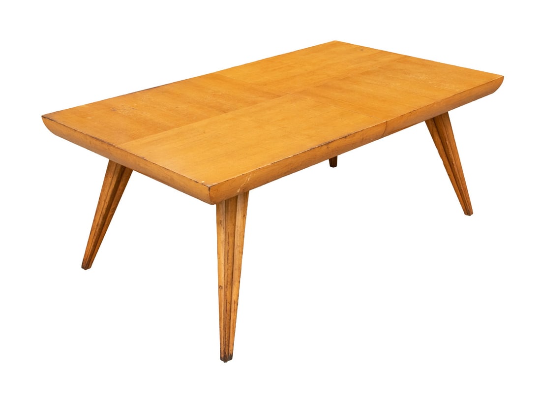 VLADIMIR KAGAN MIDCENTURY EXPANDABLE DINING TABLE: Circa 1950 Custom Crafted Walnut Rectangular Table, designed by Vladimir Kagan (NY, 1927-2016) for Kagan-Dreyfuss, with two incurved frieze and sculptural splayed legs, two additional leaves. Veneer