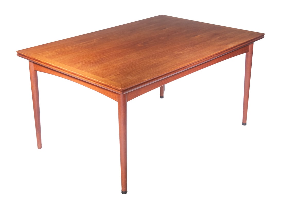 DANISH MODERN TEAK EXTENDABLE DINING TABLE: Vintage Rectangular Table, with applied molded edge top, pull-out hidden 22" leaves concealed beneath the top. Set on round tapered legs. 8'5" with leaves extended. Leaves Closed: 28 x 38 1/2 x 57 in.