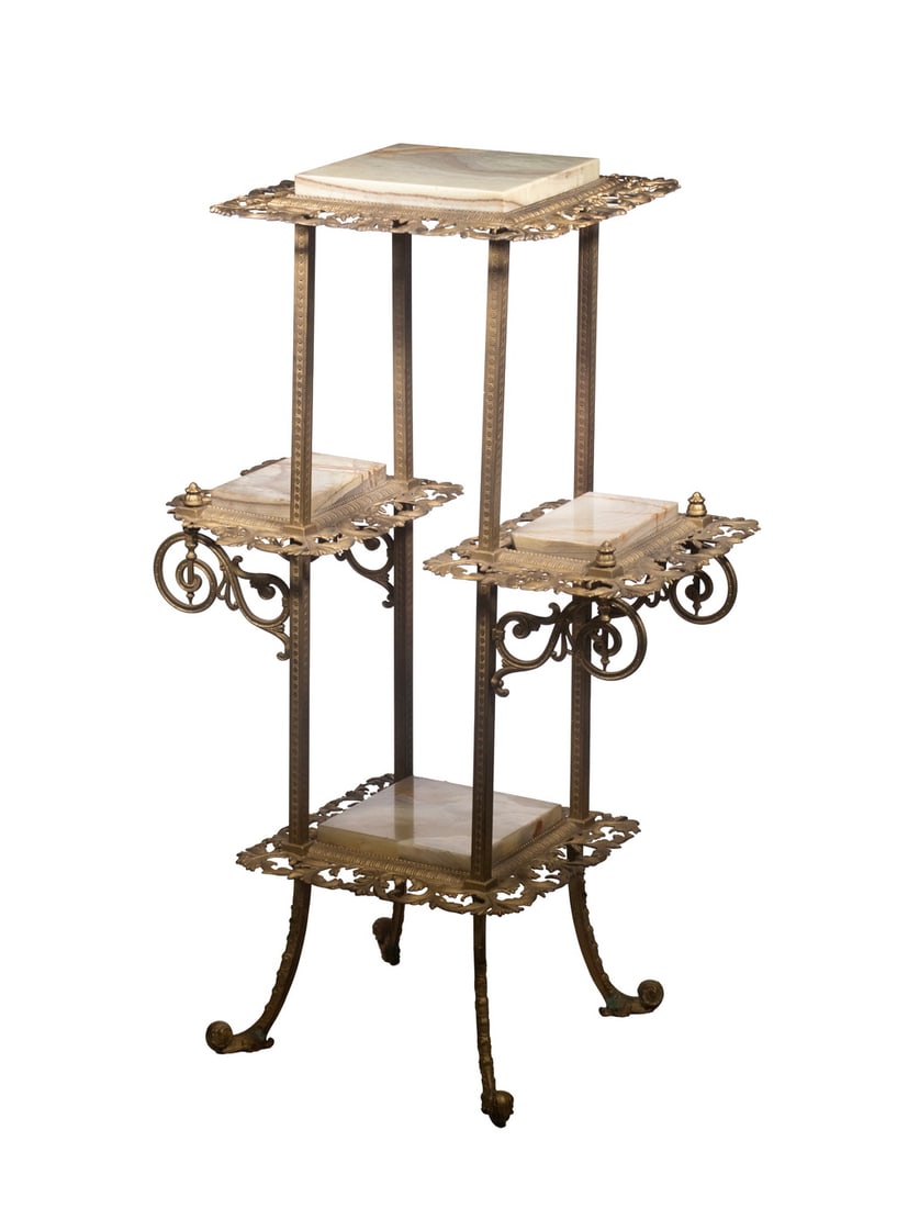 VICTORIAN CAST IRON PLANT STAND WITH ONYX TOPS: One over Two over One Shelf Rectangular Stand in gold painted iron, with loose onyx slab tops, foliate reticulated edges, scrollwork brackets, out-turned legs. 37 x 24 x 14 in. (94 x 61 x 35.6 cm.)