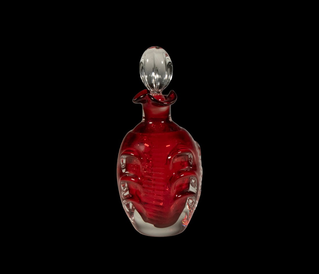 SWEDISH MIDCENTURY ART GLASS DECANTER BY BO BORGSTROM: SWEDISH MIDCENTURY ART GLASS DECANTER BY BO BORGSTROM1960s Blown Glass Stoppered Bottle by Aseda Glasbruk, designed by Bo Borgstrom, in clear over ruby red glass, with clear stopper.From the estate of