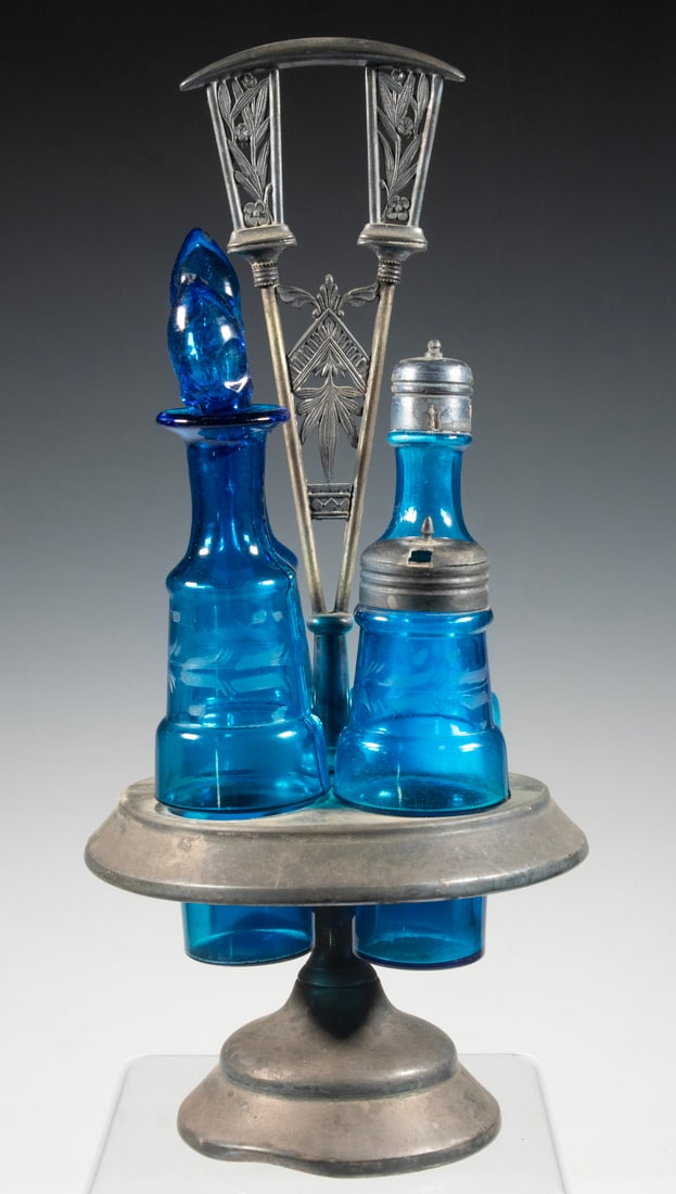VICTORIAN ROTATING CASTOR SET WITH BLUE PRESSED GLASS BOTTLES, C. 1870?1890 (1 of 1)