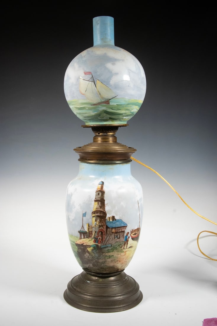 HAND-PAINTED GLASS LAMP WITH MARITIME SCENE: HAND-PAINTED GLASS LAMP WITH MARITIME SCENEA two-part electric lamp featuring hand-painted opaque glass globes. The upper globe depicts a sailing vessel under a cloudy sky, while the lower body is pai