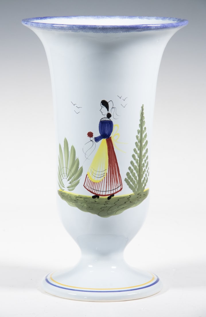 HENRIOT QUIMPER BRETON FIGURAL TRUMPET VASE: HENRIOT QUIMPER BRETON FIGURAL TRUMPET VASEFrench Glazed Pottery Tall Vase, with hand painted figural and floral decoration, flared rim and footed base.OS: 12 x 7 1/4 x 7 1/4 in. (30.5 x 18.4 x 18.4 c