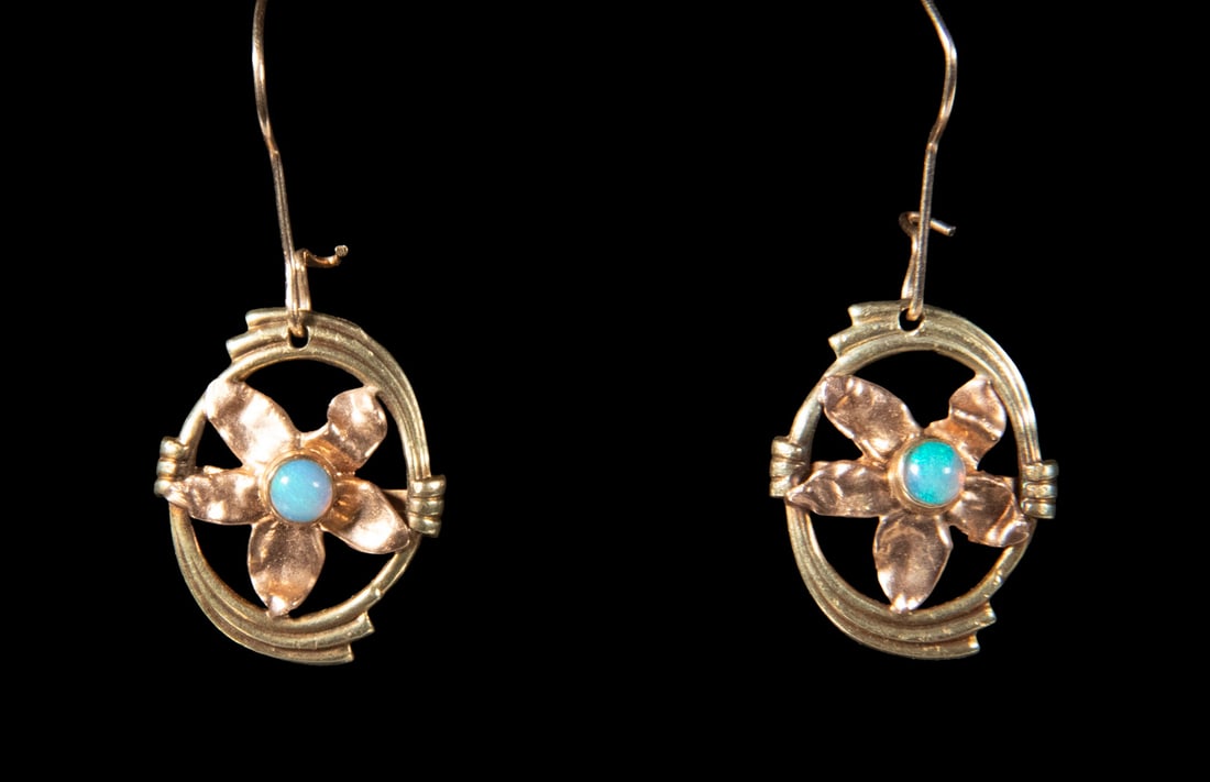PR BICOLOR 14K GOLD OPAL DROP EARRINGS: PR BICOLOR 14K GOLD OPAL DROP EARRINGSA pair of 14K yellow and rose gold drop earrings, each designed as an oval openwork frame suspending a stylized floral motif, centering a round opal cabochon disp