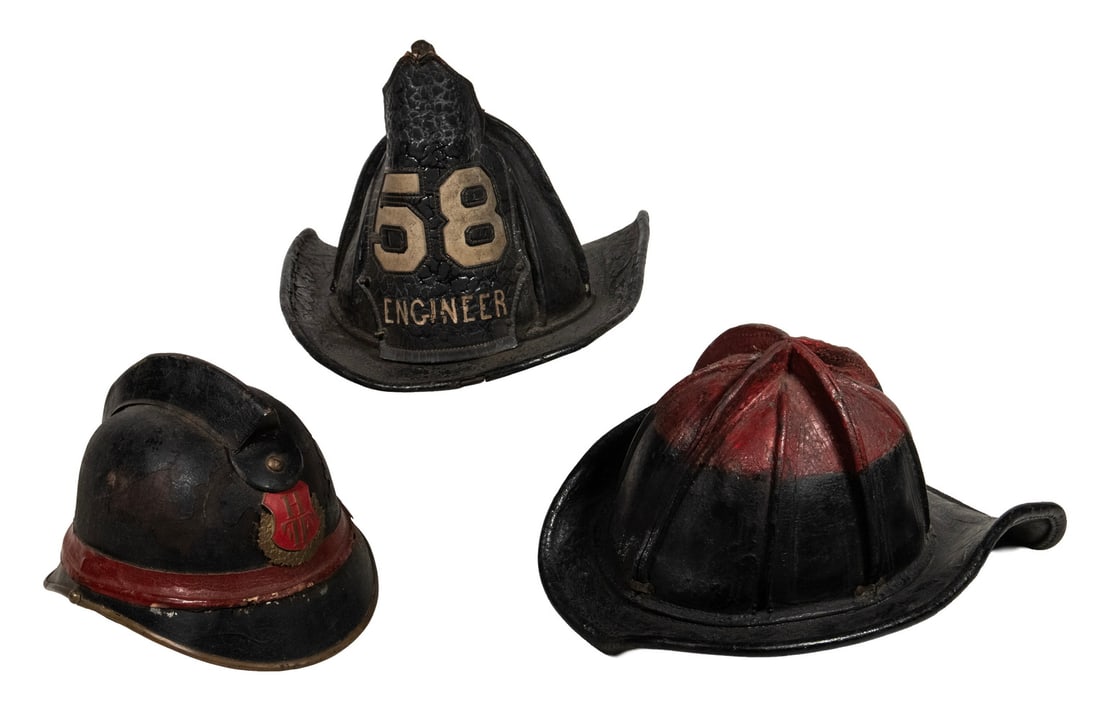 (3) 19TH C. FIREFIGHTER'S HELMETS: (3) 19TH C. FIREFIGHTER'S HELMETS (2) American & (1) French, the American helmets are in leather, one in black with placket that reads "58 Engineer", retaining the brass eagle strut at top; the other
