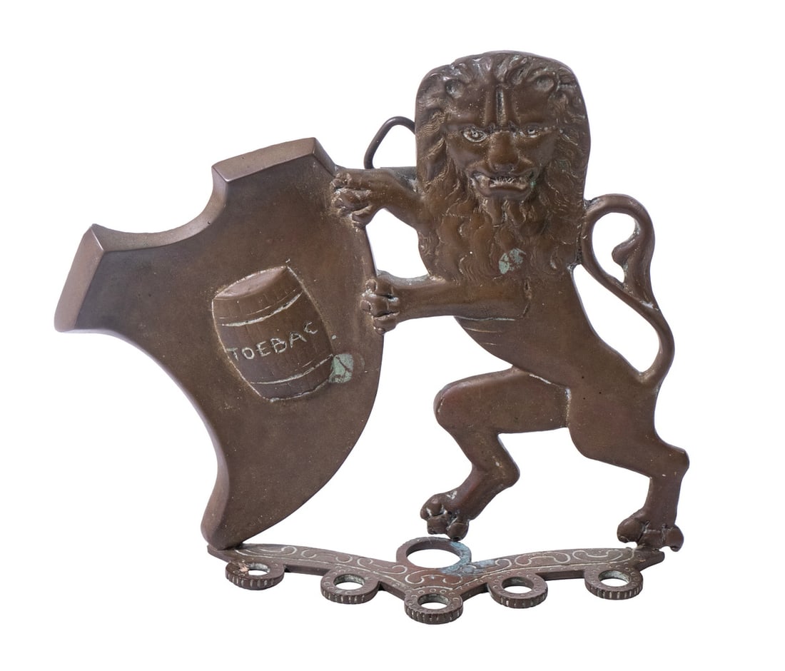 BRITISH CAST BRONZE LION-FORM PIPE STAND, EARLY 20TH CENTURY (1 of 2)