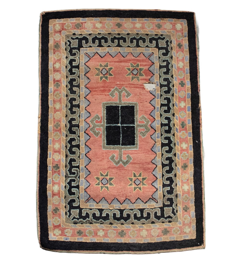 HOOKED RUG FAUX PERSIAN, MID-20TH C.: HOOKED RUG FAUX PERSIAN, MID-20TH C. Geometric Hamadan style, in pink, gray and black. Hole at inner border. Size: 37 x 25 in. (94 x 63.5 cm.)