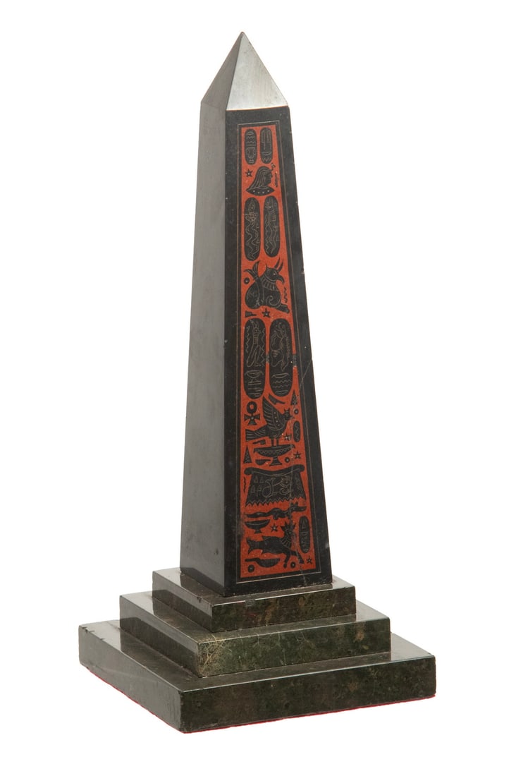 EGYPTIAN REVIVAL GRAND TOUR SLATE OBELISK: EGYPTIAN REVIVAL GRAND TOUR SLATE OBELISK 19th c. Obelisk, with incised faux hieroglyphic decoration, on a stepped base, felted underside, 5 1/4" sq. at base. Hairline crack. Size: 13 x 5 1/4 x 5 1/4