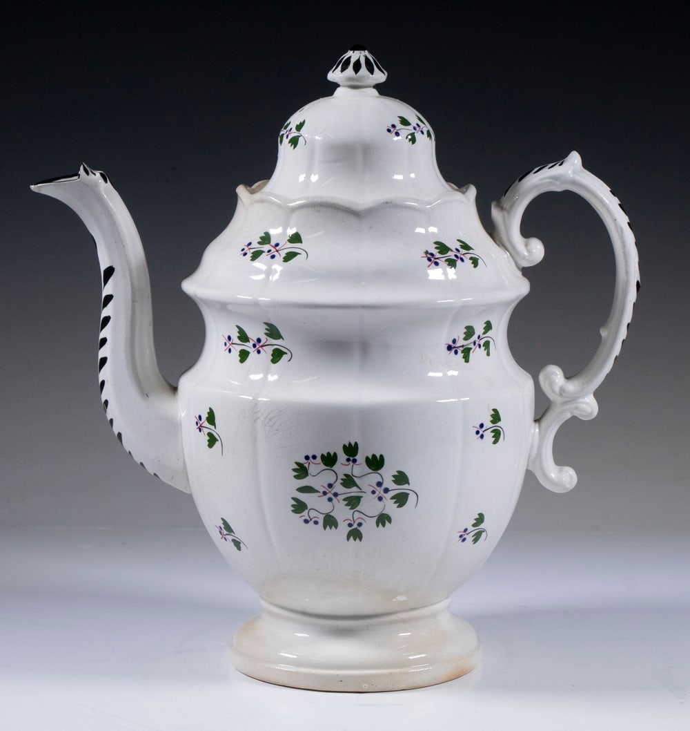 ENGLISH PEARLWARE COFFEE POT: ENGLISH PEARLWARE COFFEE POT Early 19th c. Baluster Shaped Vessel, with lobed body, domed lid, and scrolled handle, painted floral decoration. Interior rim chips, spout tip flakes. OS: 12 x 11 x 6