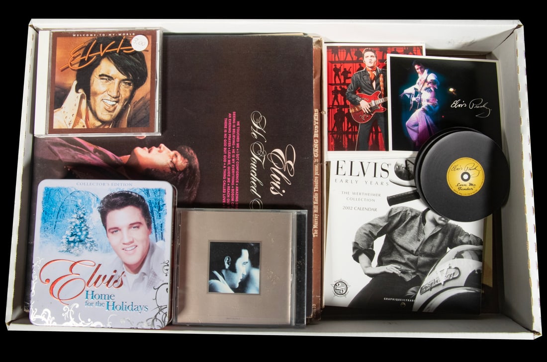 COLLECTION OF ELVIS MEMORABILIA, OTHERS: COLLECTION OF ELVIS MEMORABILIA, OTHERS Albums & CDs as seen in photos.