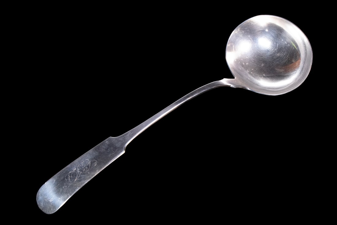 COIN SILVER LADLE BY J&W MOIR, NEW YORK: COIN SILVER LADLE BY J&W MOIR, NEW YORK American Mid-19th c. Silver Ladle by John & William Moir (NYC, active 1844-1869), with fiddlehead handle engraved CJD. 5.29 ozt. Length: 13 1/2 in. (34.3 cm.)