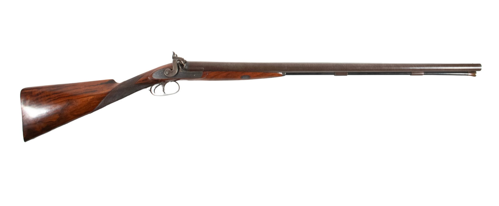 JONATHAN SMITH & SON SxS PERCUSSION-LOCK SHOTGUN, 12 BORE: JONATHAN SMITH & SON SxS PERCUSSION-LOCK SHOTGUN, 12 BORE An offering of an exquisite British-made shotgun manufactured by the firm Jonathan Smith & Son of Birmingham. The firearm features