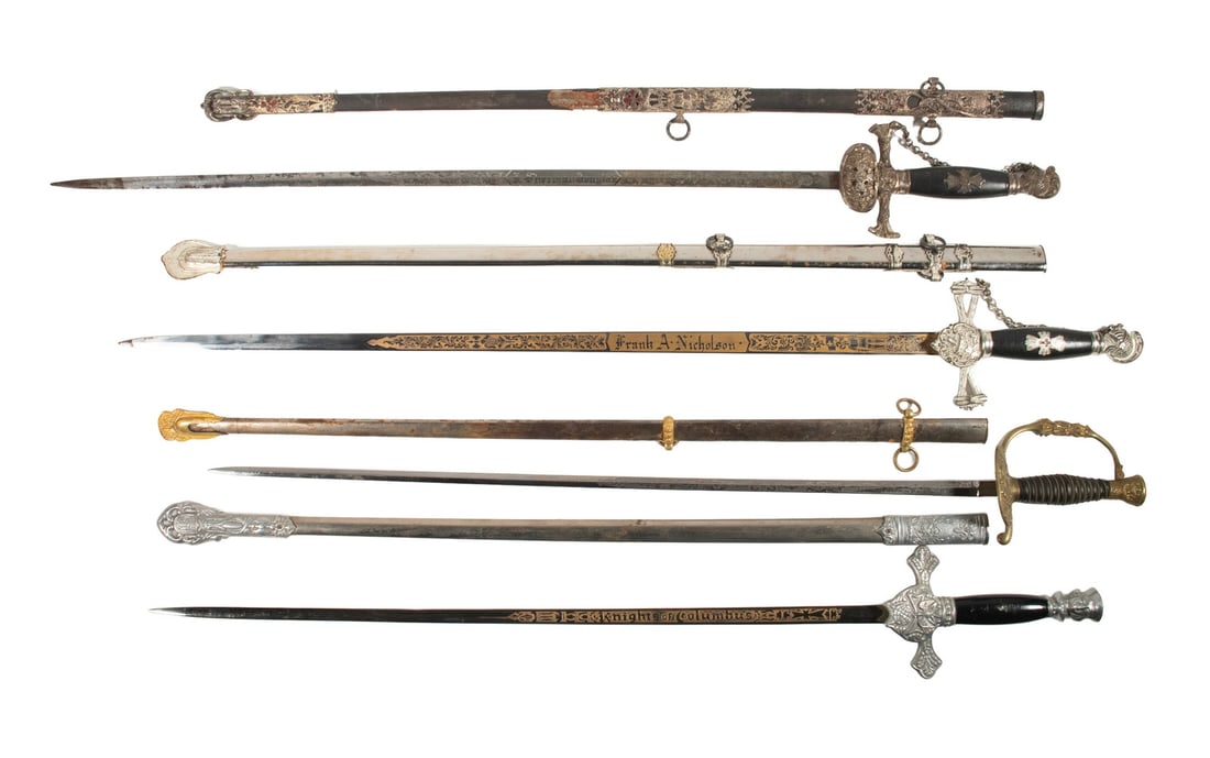 (4) CIRCA 1900 AMERICAN FRATERNAL PARADE SWORDS: (4) CIRCA 1900 AMERICAN FRATERNAL PARADE SWORDS (3) Knights of Columbus Swords & (1) Grand Army of the Republic, all in silver and black except the latter, in gold and silver finish. One of the KofC