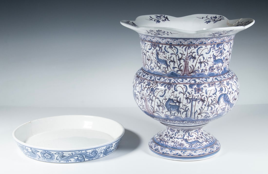 PORTUGUESE BLUE & WHITE URN & LOW BOWL: PORTUGUESE BLUE & WHITE URN & LOW BOWL (2) Piece Pottery Lot, incl: Large hand-painted footed jardiniere, with petal shape rim, decorated with animals amid a lush floral landscape. Repaired rim