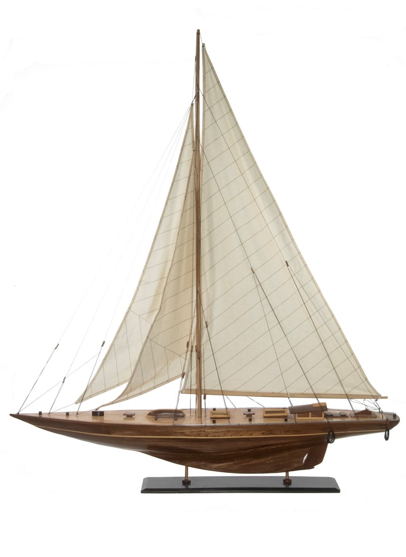 FINE YACHT DISPLAY MODEL, CIRCA 1950: FINE YACHT DISPLAY MODEL, CIRCA 1950 Hand Made Yacht Model in mahogany and ash, with birch mast, rigged. On stand. Size: 48 x 6 1/2 x 38 1/2 in. (121.9 x 16.5 x 97.8 cm.)
