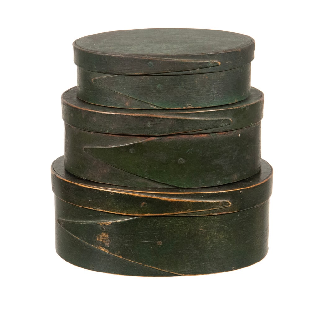 NEST OF (3) 19TH C. PAINTED OVAL PANTRY BOXES: NEST OF (3) 19TH C. PAINTED OVAL PANTRY BOXES (3) Graduated Bentwood Boxes, with green painted surface opposing single finger lapped joints. LGST: 1 1/2 x 4 x 5 1/4 in. (3.8 x 10.2 x 13.3 cm.), SMST: