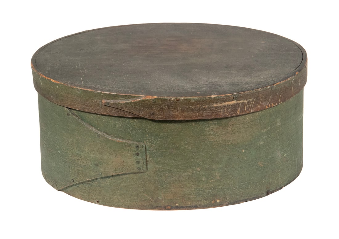 19TH C. OVAL SHAKER STYLE GREEN PAINTED BOX: 19TH C. OVAL SHAKER STYLE GREEN PAINTED BOX Early Single Finger Storage Box, with green painted surface, copper tacks. Size: 6 1/2 x 13 x 15 in. (16.5 x 33 x 38.1 cm.)