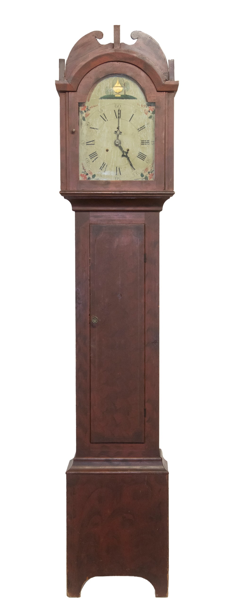 18TH C. RED PAINTED PINE GRANDFATHER CLOCK: 18TH C. RED PAINTED PINE GRANDFATHER CLOCK New England, circa 1790, in overpainted graining, with tombstone bonnet, painted wooden dial featuring a gilt memorial urn below willow trees, floral