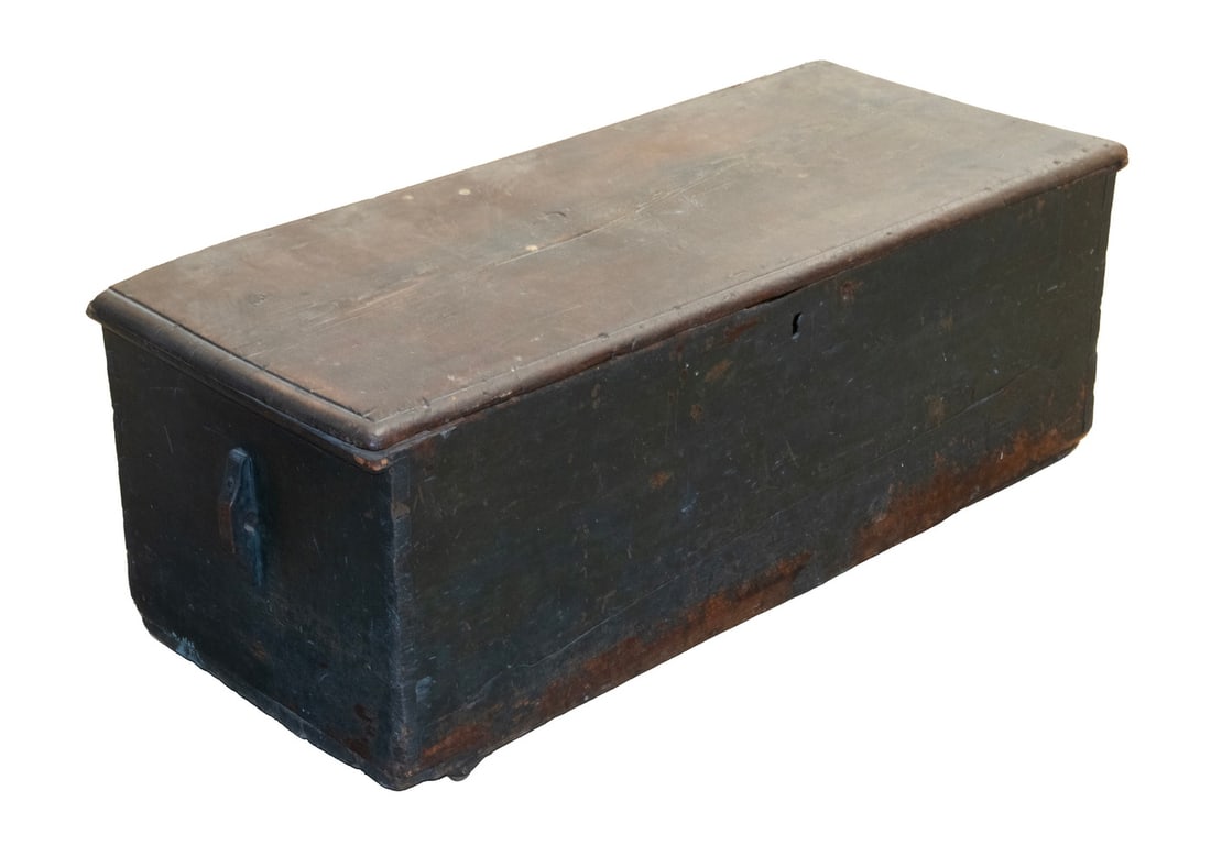 CIRCA 1850 PINE CHEST IN GREEN PAINT: CIRCA 1850 PINE CHEST IN GREEN PAINT Six Plank Chest in worn remnants of forest green paint, the top with molded edge, lapped ends, dovetail construction, the interior in old wallpaper with open till,