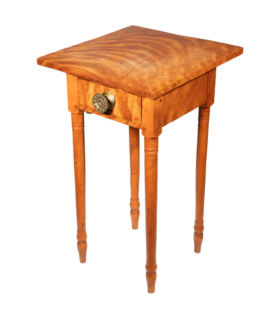 FEDERAL PERIOD FIGURED WOOD STAND: FEDERAL PERIOD FIGURED WOOD STAND 19th c. Square Stand, in highly figured wood, pegged construction, having a single drawer with repousse round brass pulls, set on turned legs. Size: 28 1/2 x 17 x 18