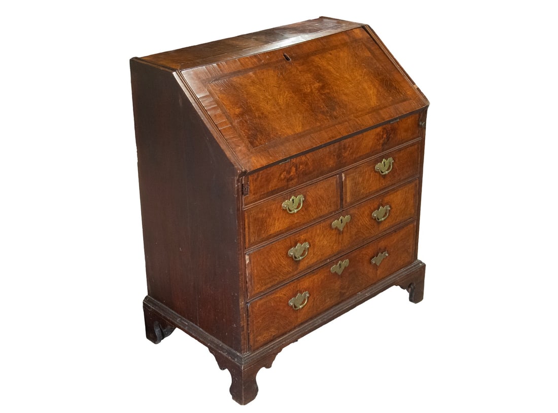 CHIPPENDALE FIGURED MAHOGANY SLANT LID DESK: CHIPPENDALE FIGURED MAHOGANY SLANT LID DESK 18th c. American Desk, having book-matched crotch mahogany veneered and parquetry inlaid top, lid and drawer fronts; the interior with seven pigeon holes,