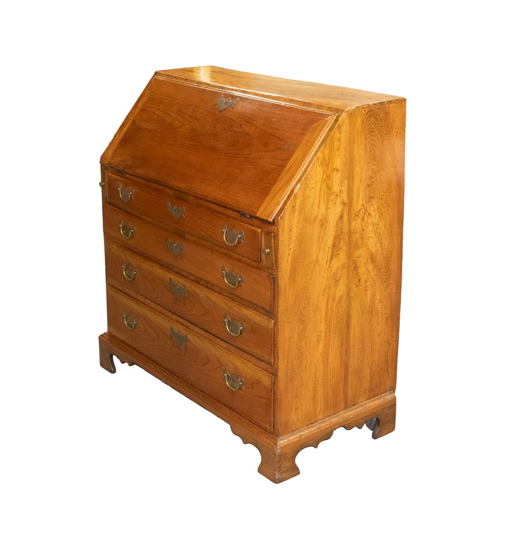 CHIPPENDALE FRUITWOOD SLANT LID DESK: CHIPPENDALE FRUITWOOD SLANT LID DESK New England 18th c. Desk, in highly figured hardwood, possibly apple wood, with brass batwing hardware and key having a molded edge fall front lid with pull-out