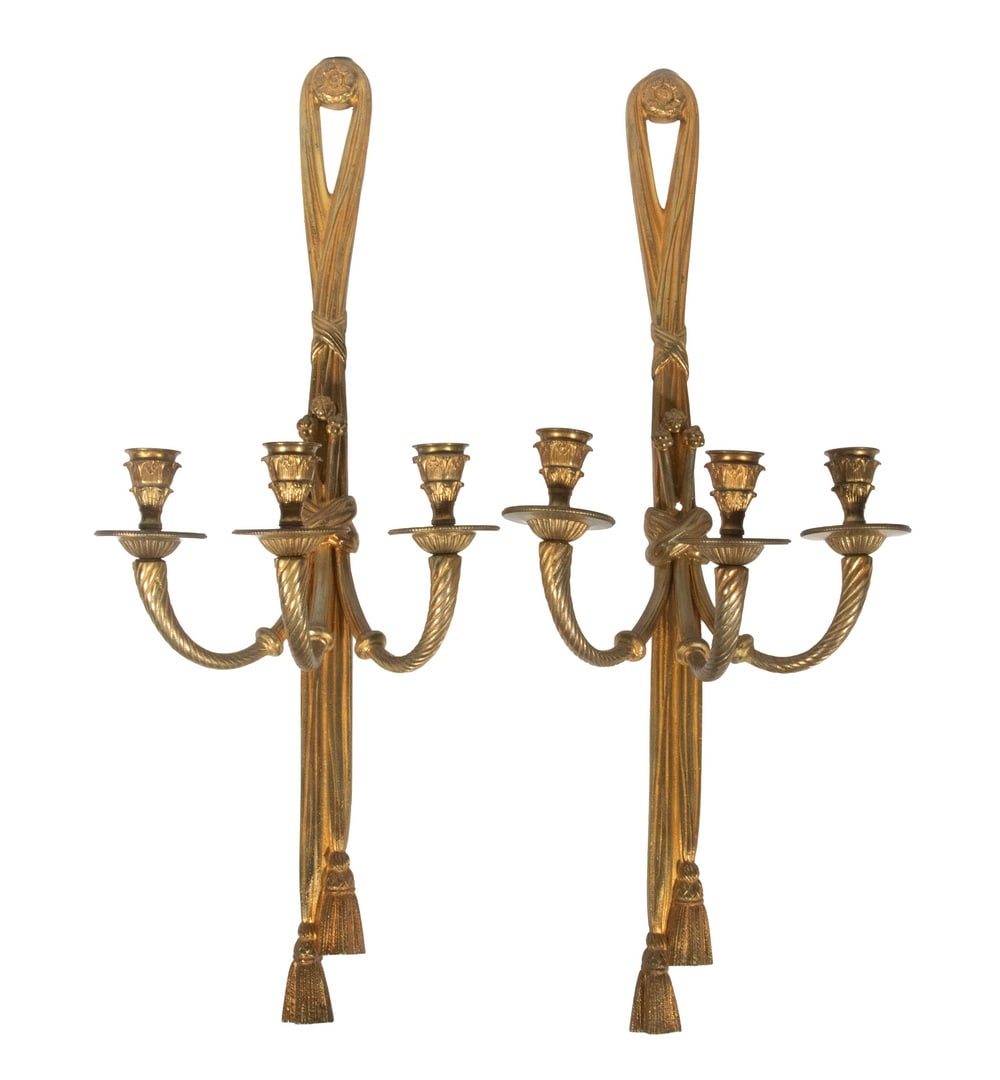 PAIR OF 20TH C. FRENCH STYLE CANDLE SCONCES: PAIR OF 20TH C. FRENCH STYLE CANDLE SCONCES Gilt Brass Three-light Candle Sconces in the form of fabric drops with tassels, acanthus leaf sockets are supported by roped arms. These are NOT wired for e