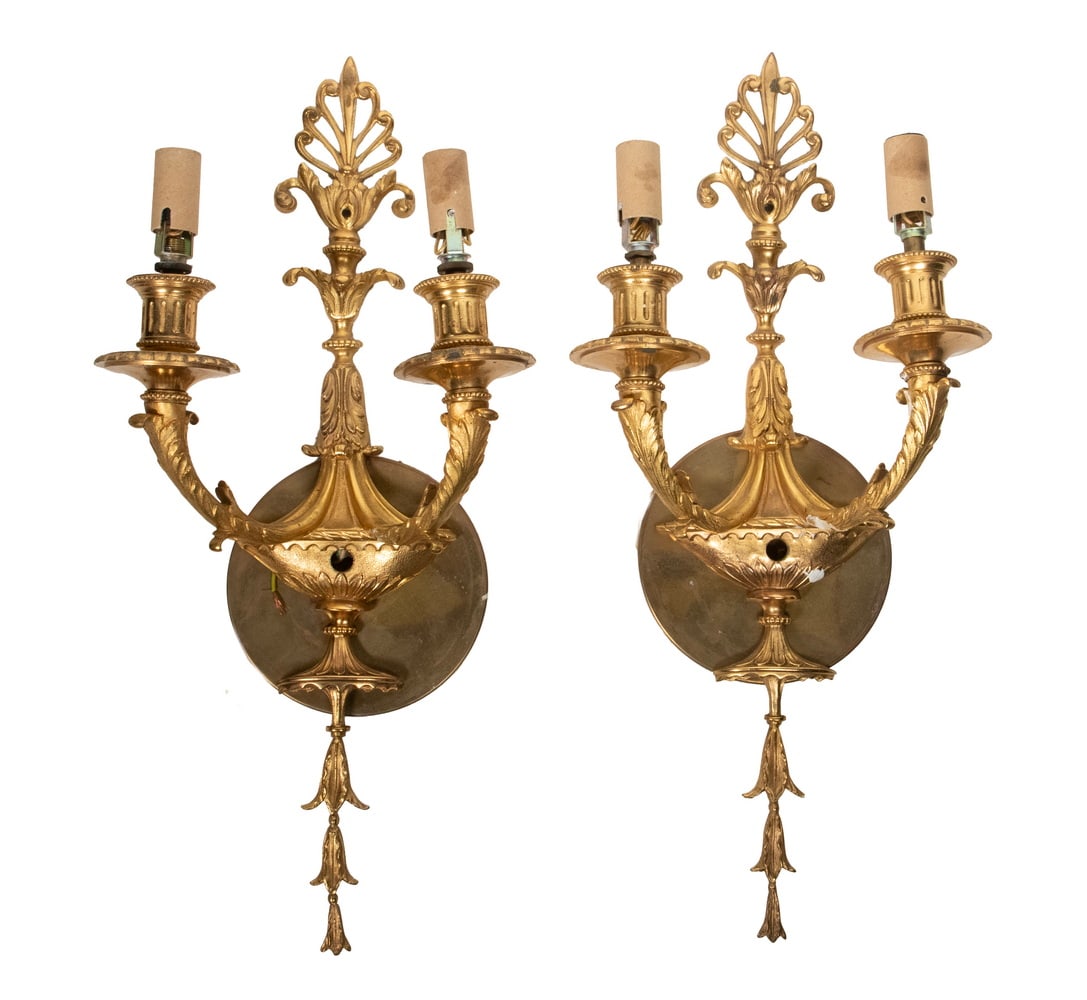 PAIR OF EARLY 20TH C. FRENCH GILT BRASS GREEK REVIVAL SCONCES: PAIR OF EARLY 20TH C. FRENCH GILT BRASS GREEK REVIVAL SCONCES Oil lamp form backplate with pendant bellflowers, surmounted by palmettes, two acanthus leaf arms support electrified candles. Size, Each: