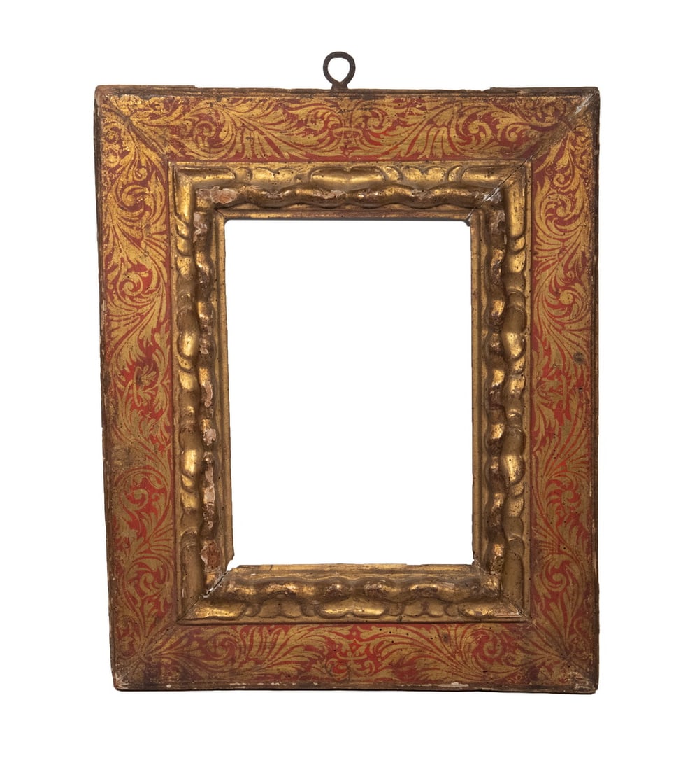 17TH C. SPANISH BAROQUE FRAME: 17TH C. SPANISH BAROQUE FRAME Carved Wood Frame with gilt decoration on a red ground, forged iron hanger. Losses to bottom edge. Size: 18 x 15 in. (45.7 x 38.1 cm.), Opening: 11 1/2 x 8 1/2 in. (29.2