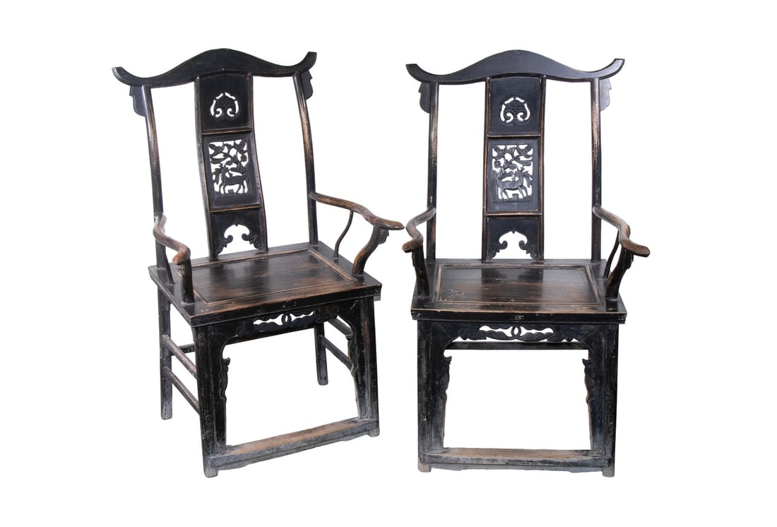 PAIR OF CHINESE QING ANCESTRAL THRONES: PAIR OF CHINESE QING ANCESTRAL THRONES 19th c. Classic Ming form, elm in remnants of old black lacquer, having a yoke rail, pierced back splat featuring deer that reverses on the opposing chair, with 