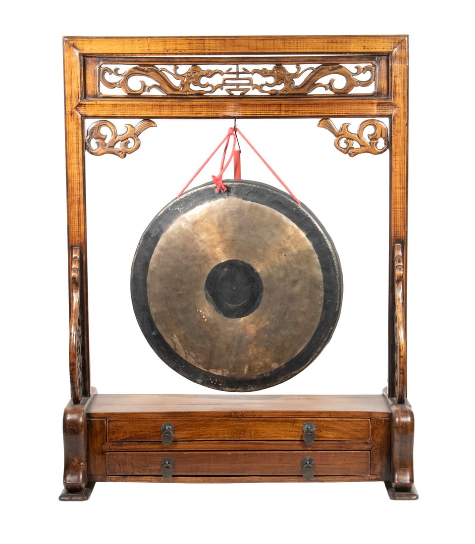 19TH C. CHINESE GONG ON MAHOGANY STAND: 19TH C. CHINESE GONG ON MAHOGANY STAND Lightweight Spun Brass 16" gong with black painted bullseye and rim, Chinese scratched mark on back, suspended by modern cord from hongmu (mahogany) stand with