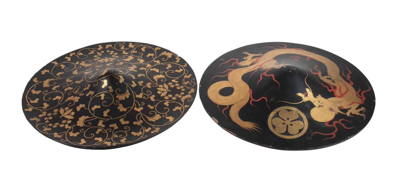 (2) EDO SAMURAI LACQUERED PARADE HATS: (2) EDO SAMURAI LACQUERED PARADE HATS 19th c. Japanese Lacquered Wooden Hat (Jingasa) Samurai Processional Hat in black with gilt decoration of a writhing dragon on one, which bears the Toy Can mon an