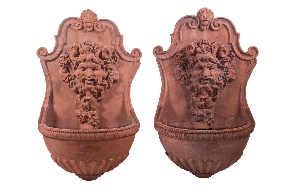 (5) TERRA COTTA NEO-CLASSICAL GARDEN WALL POCKETS: (5) TERRA COTTA NEO-CLASSICAL GARDEN WALL POCKETS Garden Planters consisting of Large Pair with Green Man Heads on Baroque backplate, 27" x 15 1/2" x 8"; Medium Pair of Winged Cupid Heads, 12" x 17"