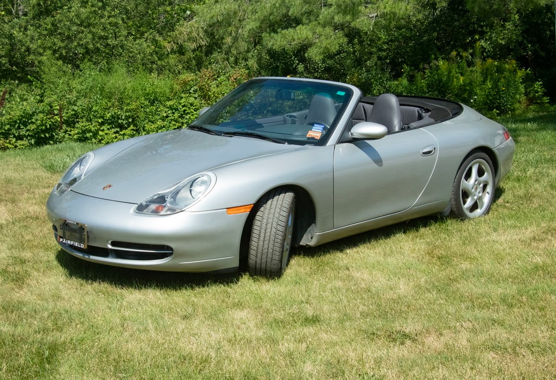 1999 PORSCHE 911 CARRERA CABRIOLET: 1999 PORSCHE 911 CARRERA CABRIOLET An offering of an excellent, low-mileage Porsche Convertible. The vehicle is fitted with an M96 Flat-6 206 cu. in. engine delivering 296 horsepower with a 5-speed
