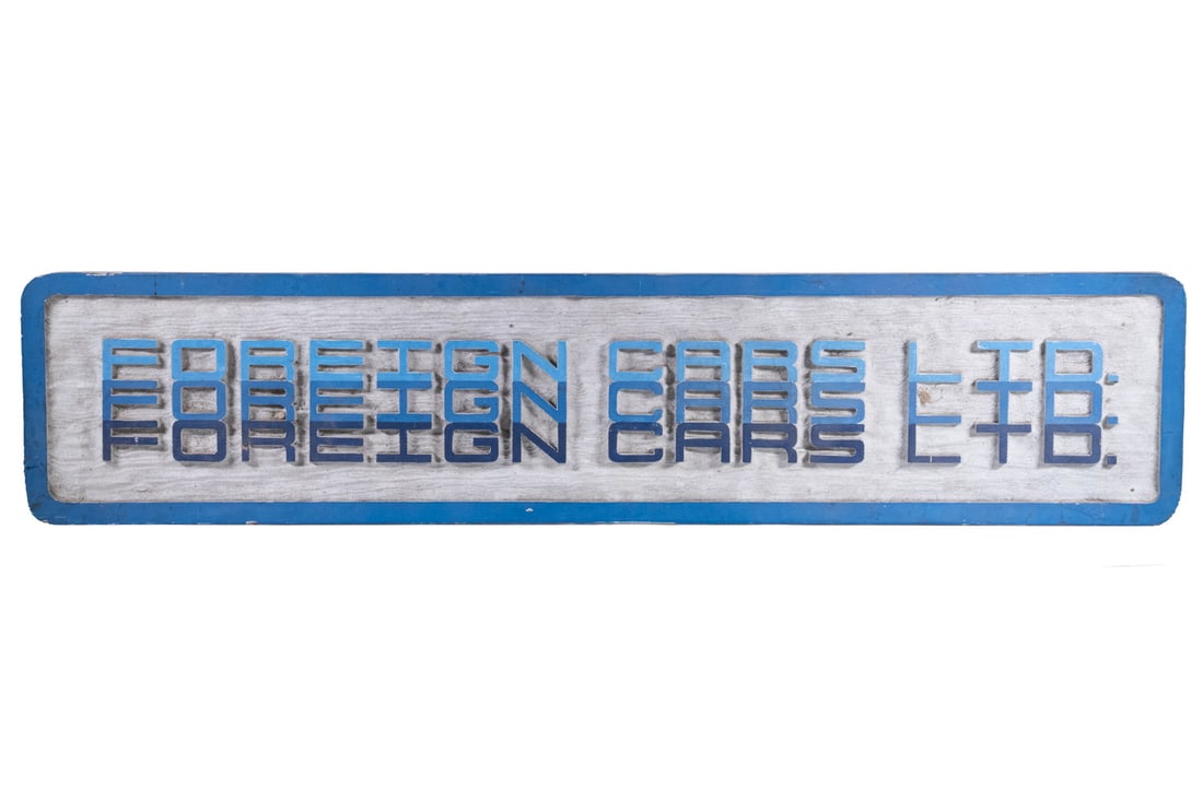 CUSTOM "FOREIGN CARS LTD." WOODEN BUSINESS SIGN: CUSTOM "FOREIGN CARS LTD." WOODEN BUSINESS SIGN Mid-20th c. Carved and Painted Sign, for an automotive dealership or repair shop, rectangular shape with back mounted hanging hardware. Size: 9 1/4 x