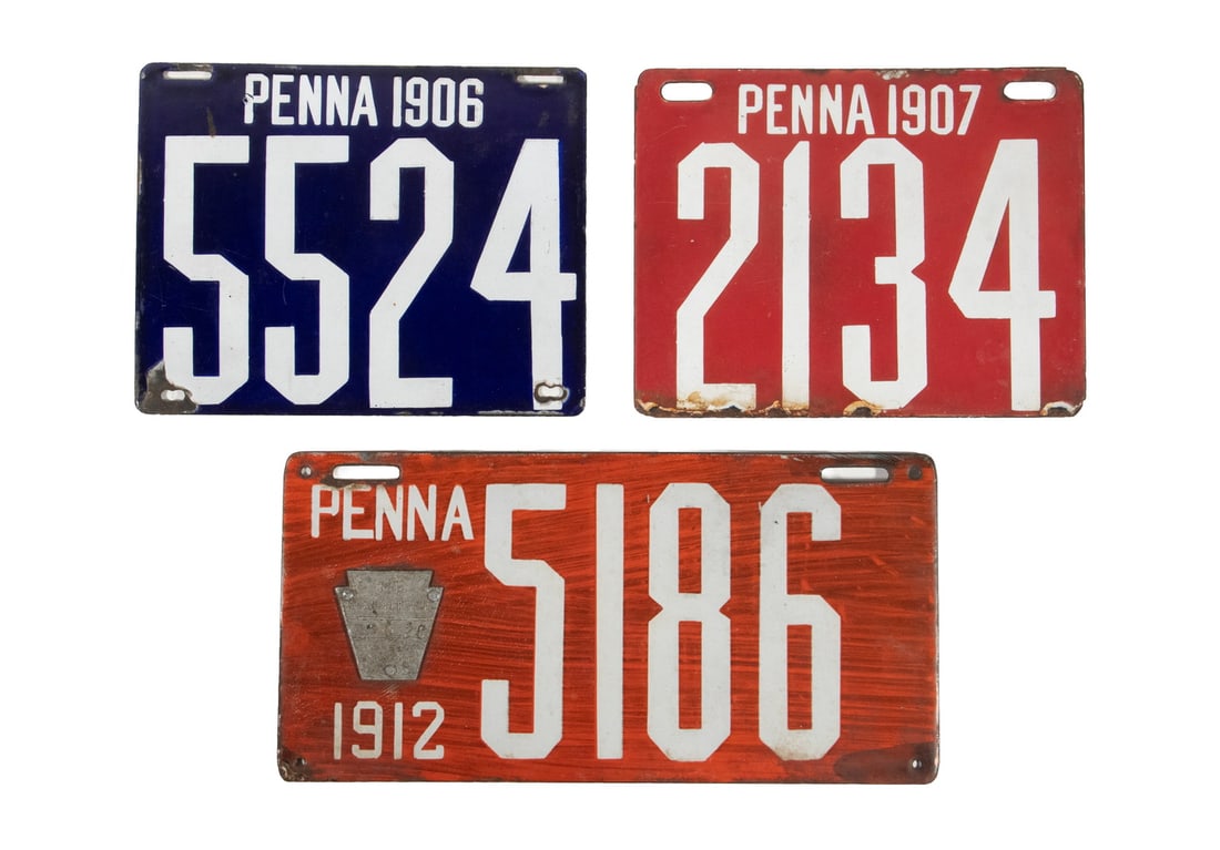 (3) EARLY PENNSYLVANIA PORCELAIN LICENSE PLATES: (3) EARLY PENNSYLVANIA PORCELAIN LICENSE PLATES A group of three early Pennsylvania porcelain automobile license plates including examples dated 1906, 1907, and 1912. All featuring embossed numerals