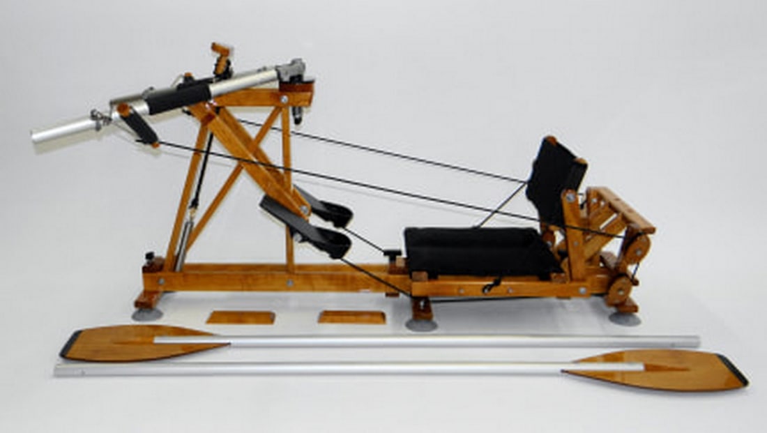 FRONTROWER ROWING SYSTEM: FRONTROWER ROWING SYSTEM The FrontRower rowing system includes frame, seat, and oars
