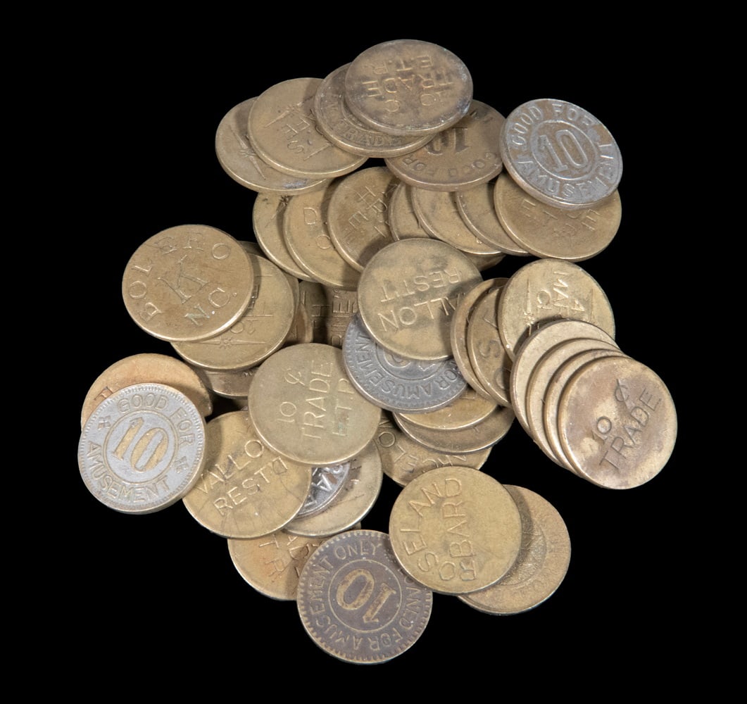 (38) 1930'S-40'S SLOT MACHINE TOKENS MOSTLY SHANGHAI: (38) 1930'S-40'S SLOT MACHINE TOKENS MOSTLY SHANGHAI Issued by popular Bars among US Marines and Sailors. 10c trade. Many from clubs owned by the gangster and 'Slot Machine King' Edward Thomas