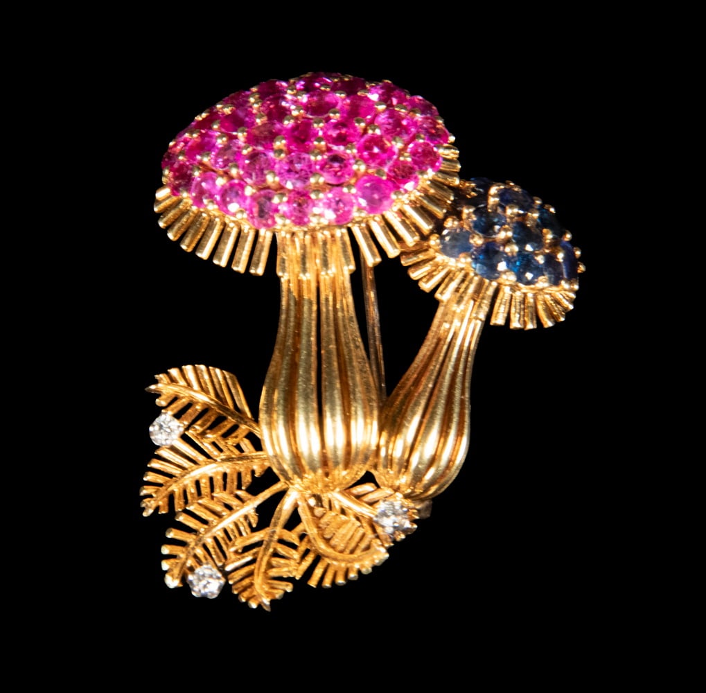 TIFFANY GOLD, PINK, BLUE SAPPHIRE AND DIAMOND NATURALISTIC BROOCH: TIFFANY GOLD, PINK, BLUE SAPPHIRE AND DIAMOND NATURALISTIC BROOCH A sculptural 18K gold naturalistic brooch designed as two stylized mushroom forms. The larger dome pav -set with (39) pink sapphires m