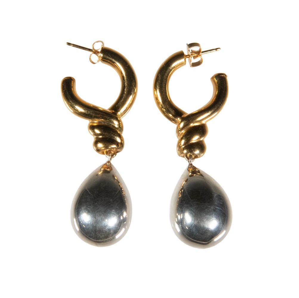PR 18K GOLD DROP EARRINGS: PR 18K GOLD DROP EARRINGS A pair of 18K gold drop earrings featuring polished hoop tops with a twisted accent, suspending large hollow teardrop-form drops. The drops exhibit a high-polish,