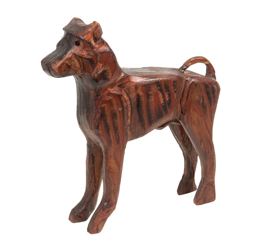 BERNARD LANGLAIS (ME/NY, 1923-1977): BERNARD LANGLAIS (ME/NY, 1923-1977) "Dog", layered and scorched plywood, varnished, signed with stamped letters along the spine. From a private collection in Boothbay, Maine. Size: 11 x 2 1/4 x 10
