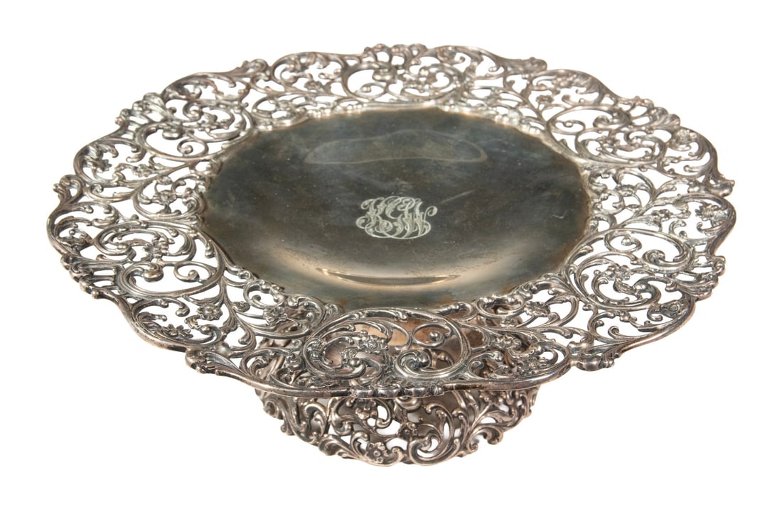 HOWARD & CO. STERLING SILVER FOOTED TAZZA: HOWARD & CO. STERLING SILVER FOOTED TAZZA Circa 1900 Centerpiece Compote, by Howard & Co., New York, #861, having a scroll and floral design pierced rim and foot, engraved KGM center script monogram, 