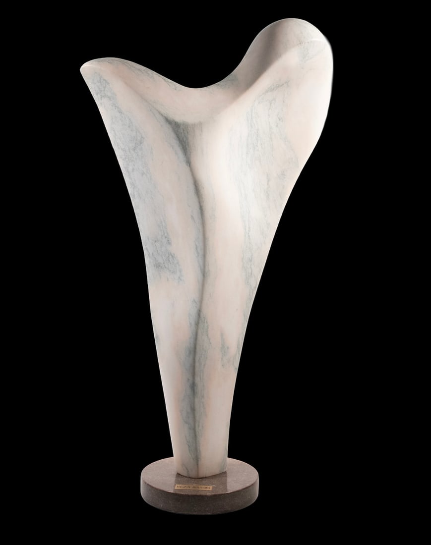 REZA BASSIRI (IRAN/CANADA, 20TH CENTURY): REZA BASSIRI (IRAN/CANADA, 20TH CENTURY) Monumental Carved Pale Pink and Veined Grey Marble Abstract in cloven spatulate form, mounted on disc of grey stone with brass nameplate. Size: 39 x 20 x 13