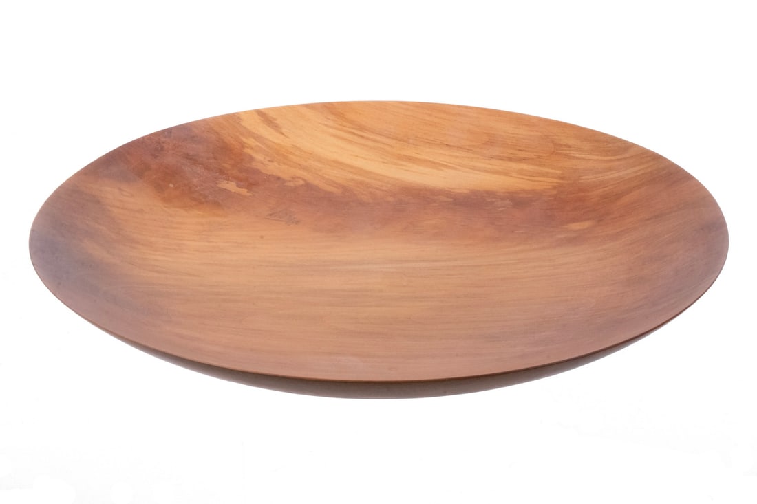 TED BARTHOLOMEW TURNED MADRONA WOOD PLATE: TED BARTHOLOMEW TURNED MADRONA WOOD PLATE Shallow Charger, signed, numbered 2065. Marked Tacoma Size: 1 1/2 x 12 x 12 in. (3.8 x 30.5 x 30.5 cm.)