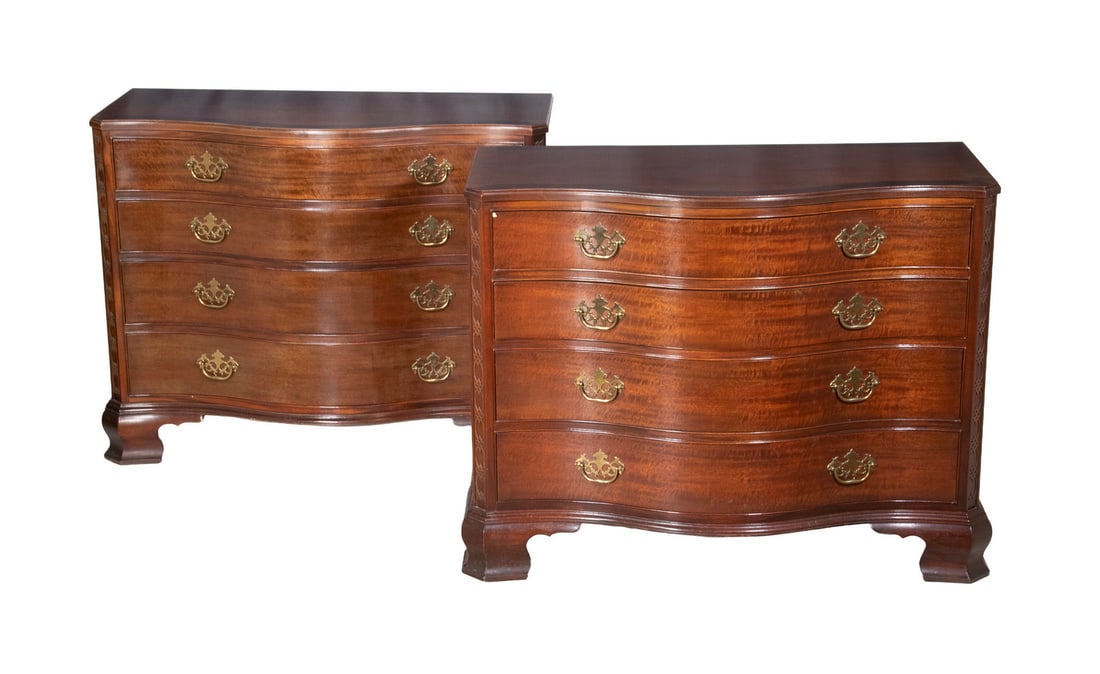 PR BAKER HISTORIC CHARLESTON CHIPPENDALE CHEST: PR BAKER HISTORIC CHARLESTON CHIPPENDALE CHEST Pair of Custom Mahogany Serpentine Front Four-Drawer Chests by Baker, each with crossbanded molded edge top, canted and carved front corners, four